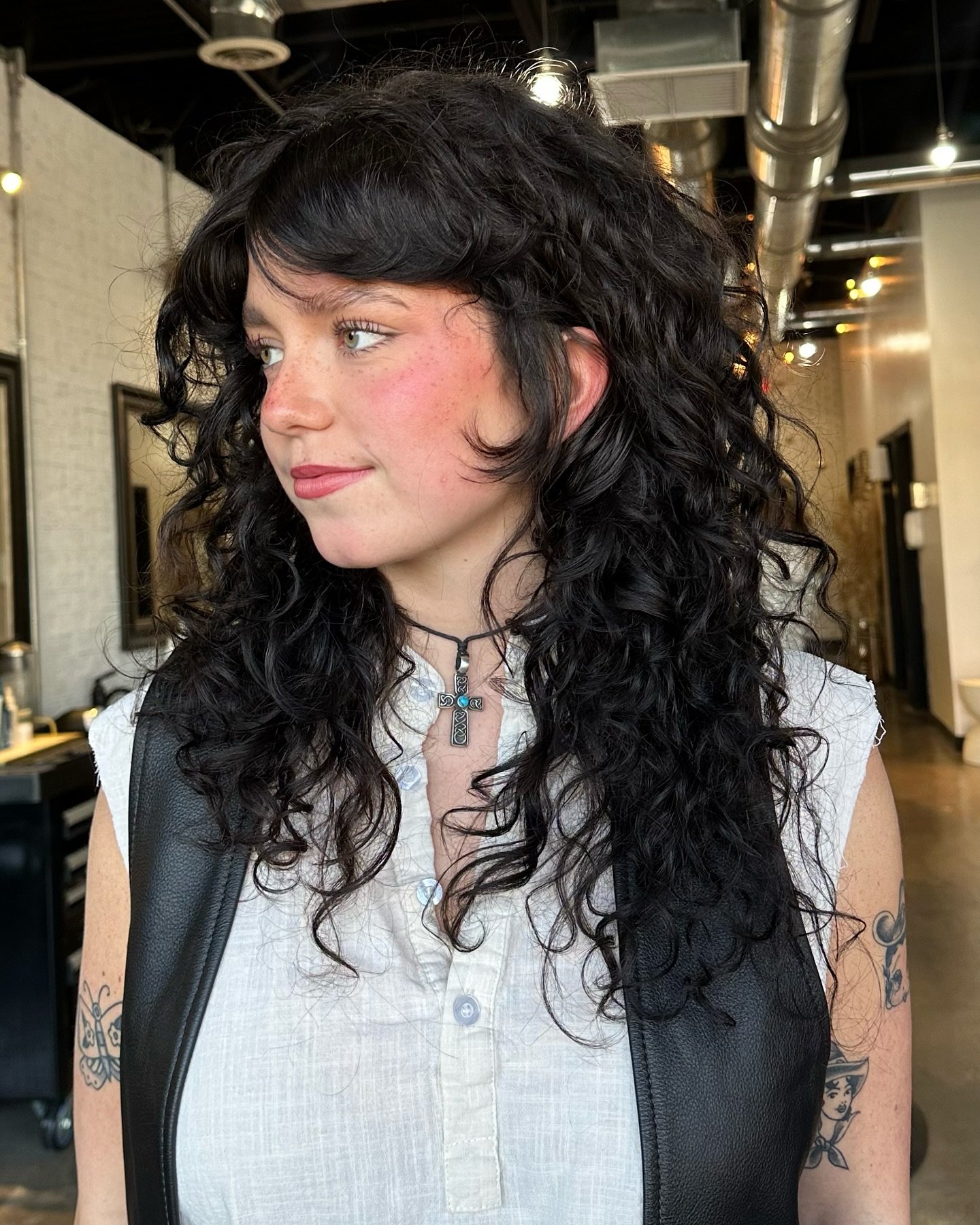 Bold Curly Shag with Face-Framing Layers