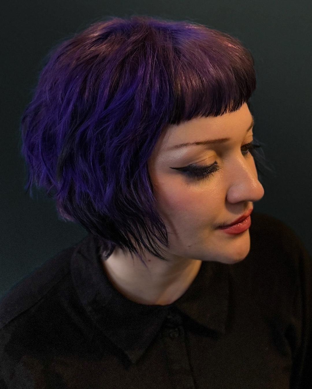Bold Textured Bob with Vibrant Purple Highlights