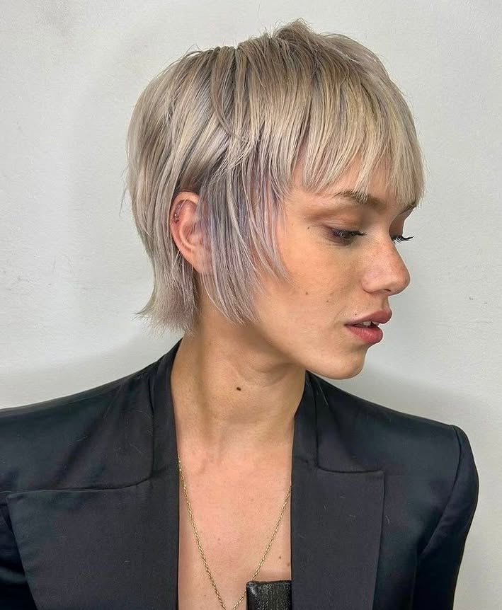 Chic Textured Pixie Cut with Subtle Lavender Undertones