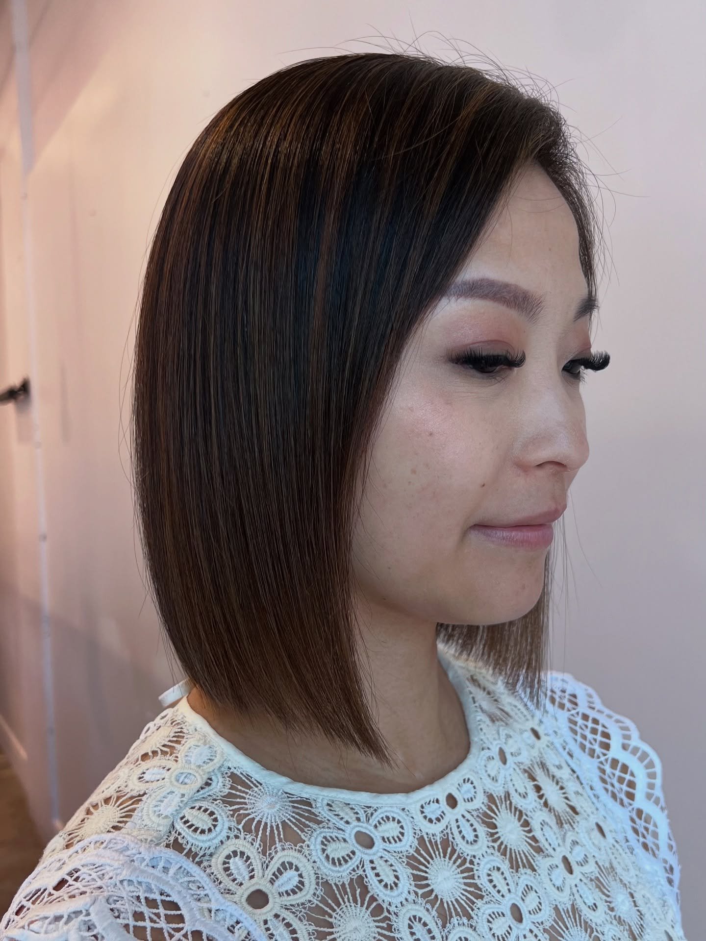 Sleek Blunt Bob with Subtle Caramel Undertones