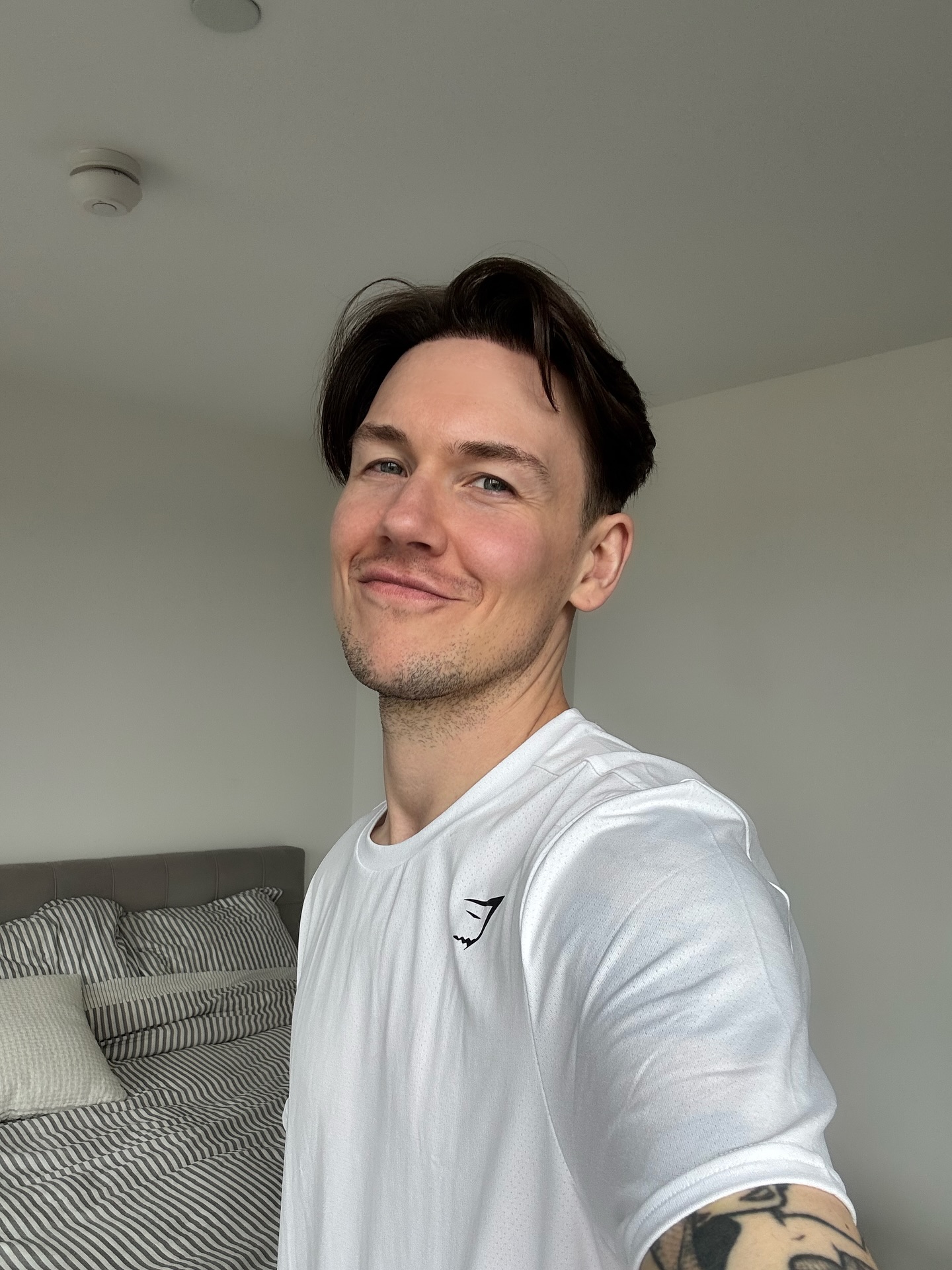 Sleek Medium-Length Tapered Cut with Side Part