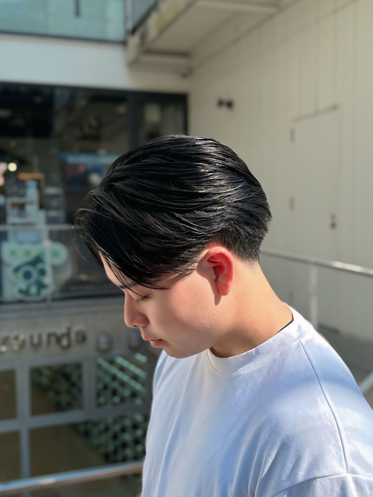Sleek Textured Undercut with Side-Swept Bangs