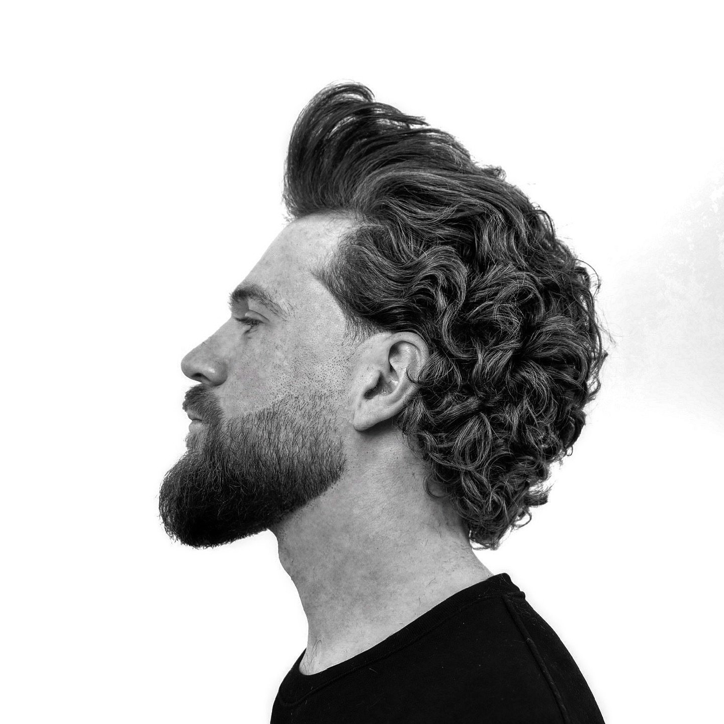 Textured Curly Quiff with Defined Volume