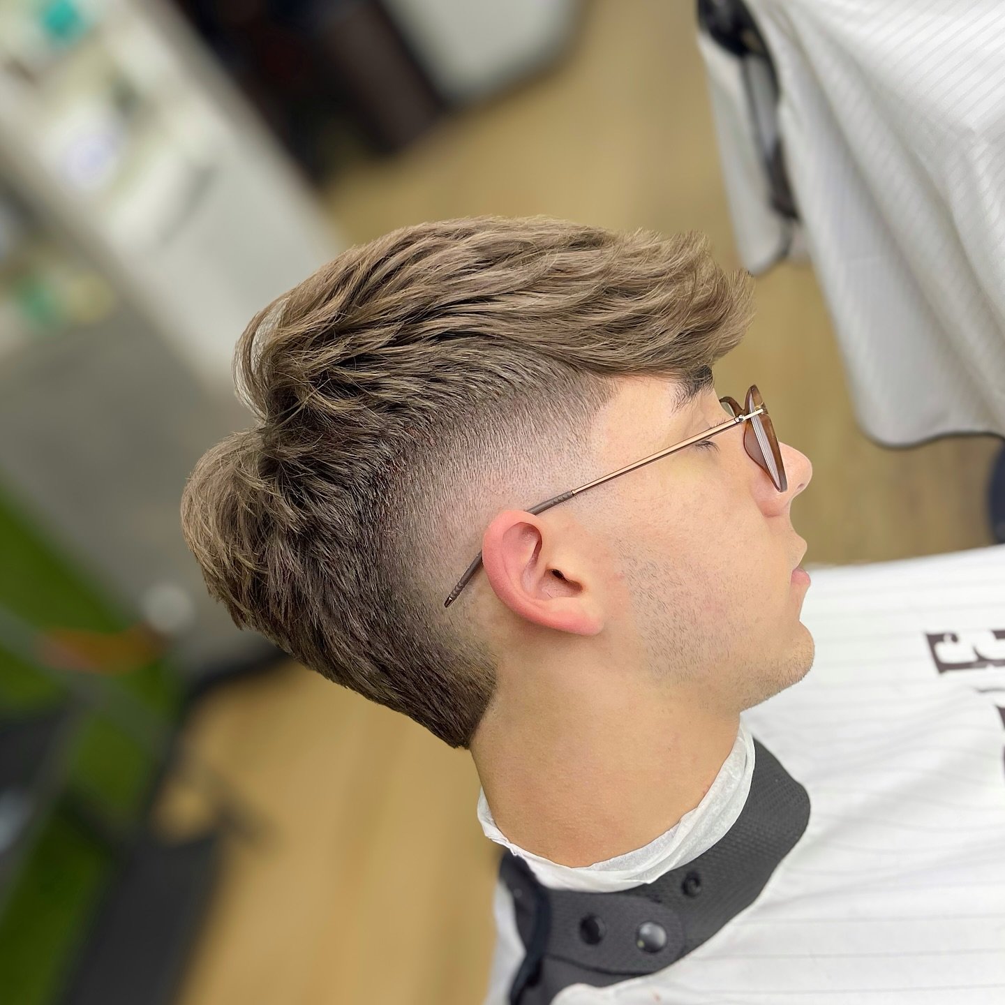 Textured High-Volume Faux Hawk with Tapered Sides