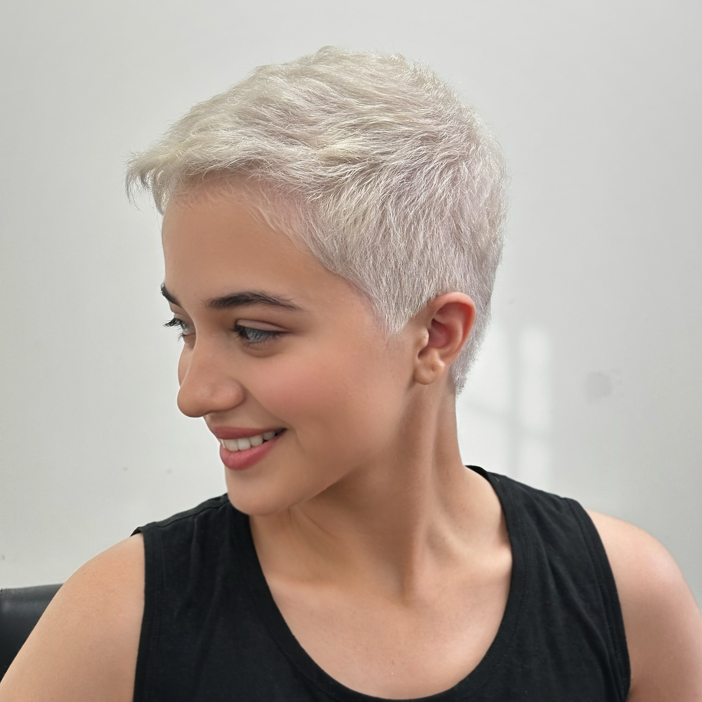 Textured Platinum Pixie Cut with Subtle Volume