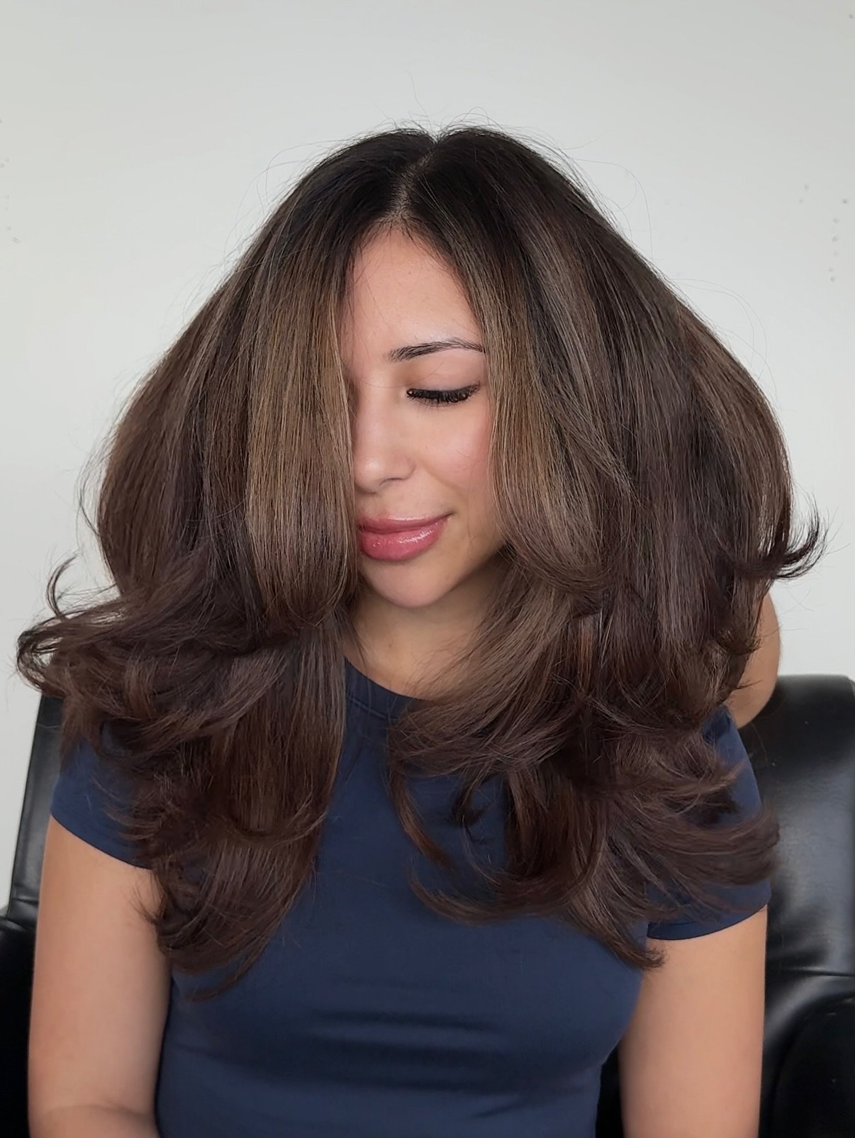 Voluminous Long Layers with Rich Chocolate Tones