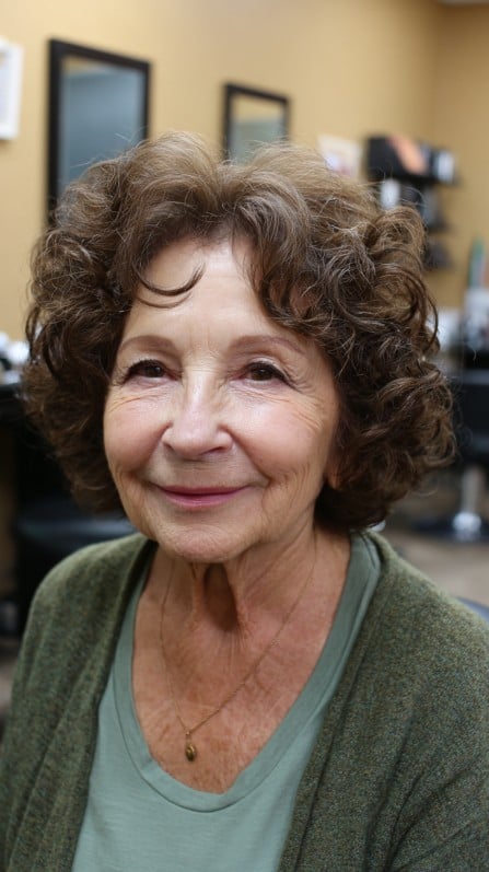 Radiant Chestnut Curls with Soft Volume