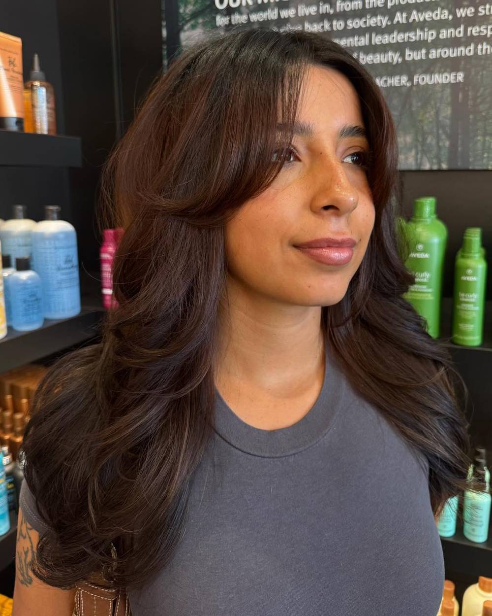 Layered Chocolate Waves with Face-Framing Bangs