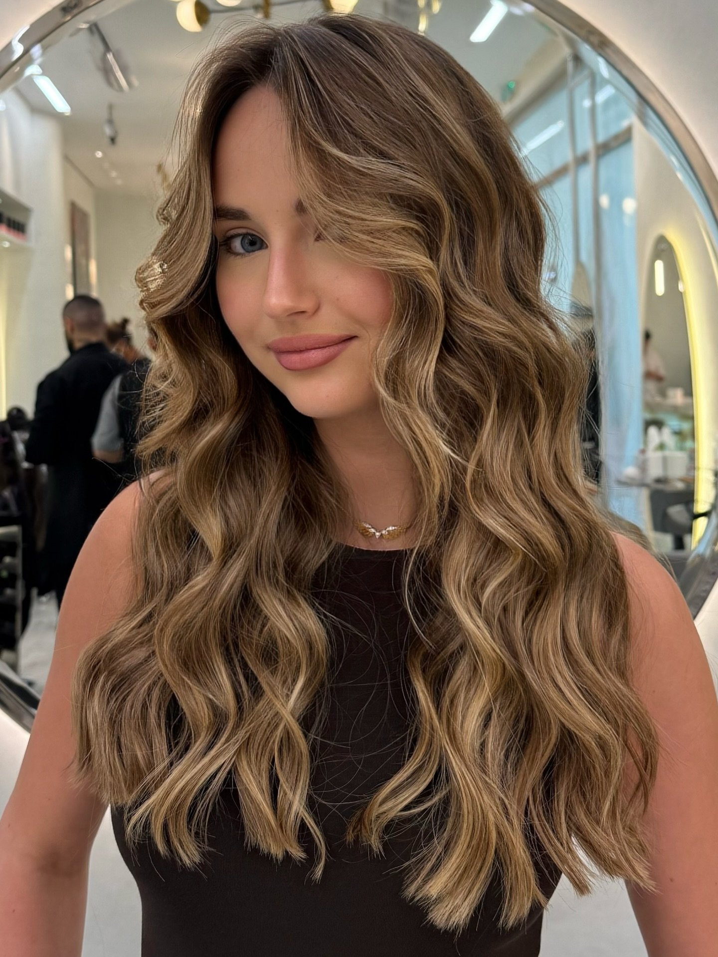 Cascading Caramel Waves with Luminous Highlights