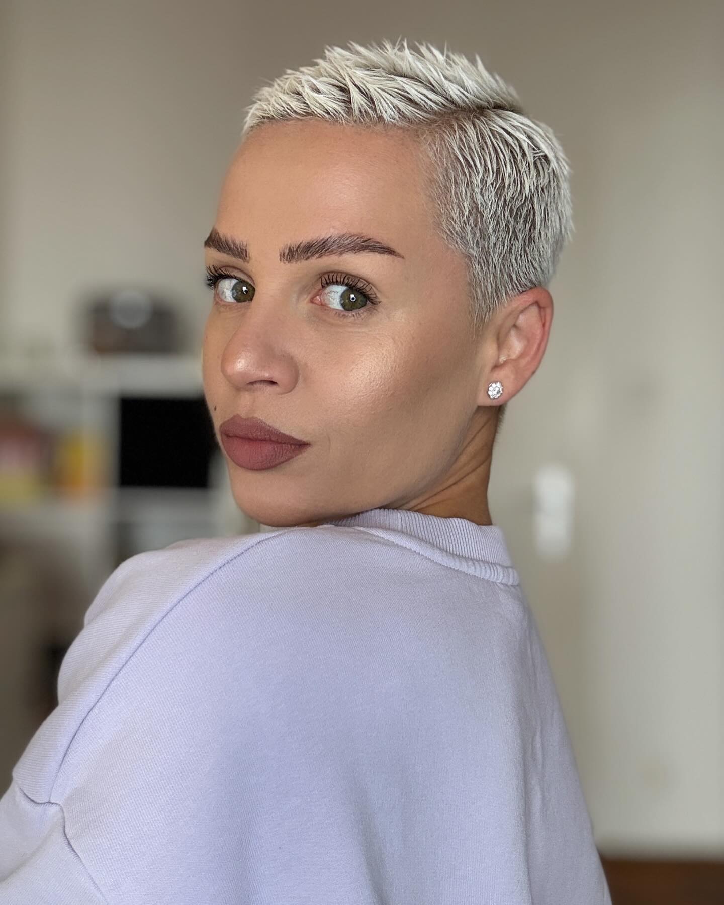 Striking Platinum Pixie with Tapered Sides