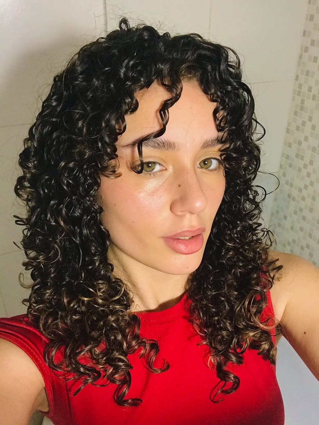 Classic Spiraled Chestnut Curls with Natural Highlights
