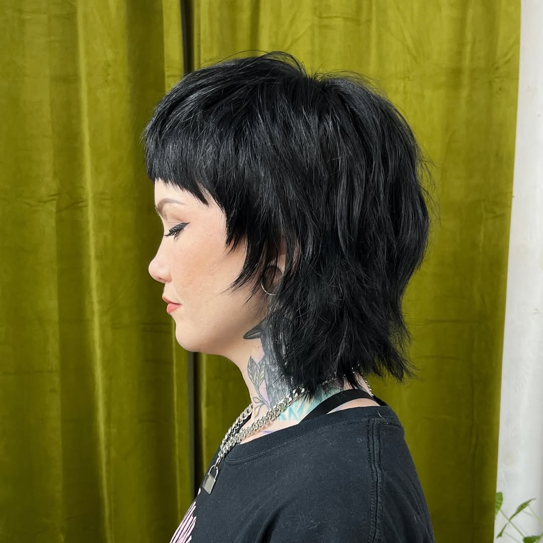 Edgy Midnight Shag with Fringed Bangs