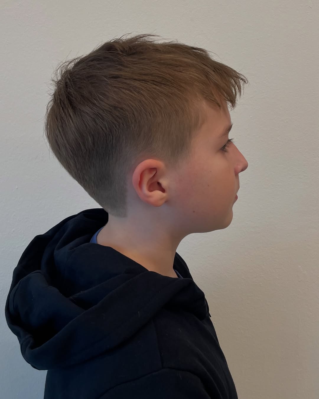 Clean-Cut Tapered Top with Natural Side Sweep