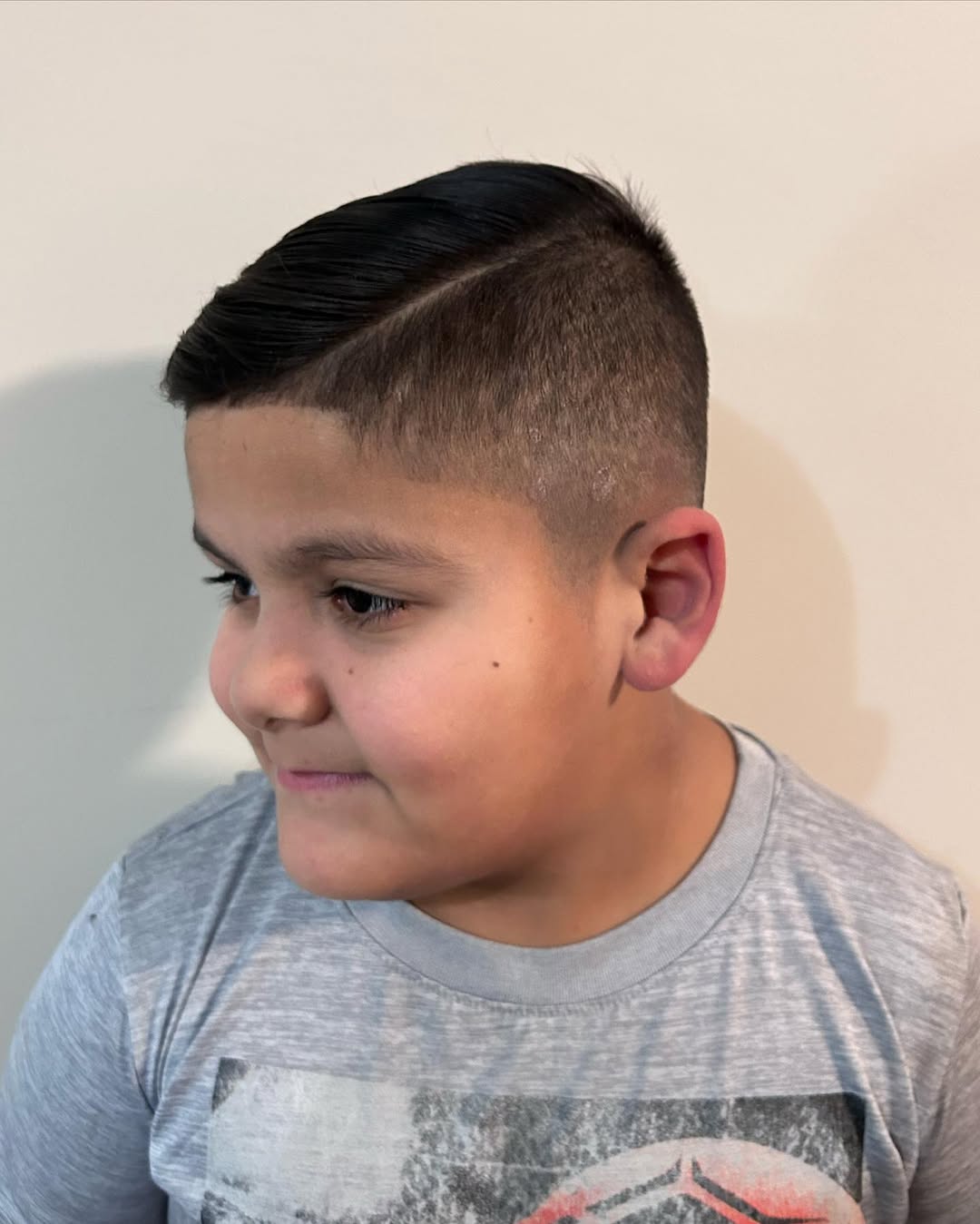 Slicked-Back Undercut with Sharp Fade