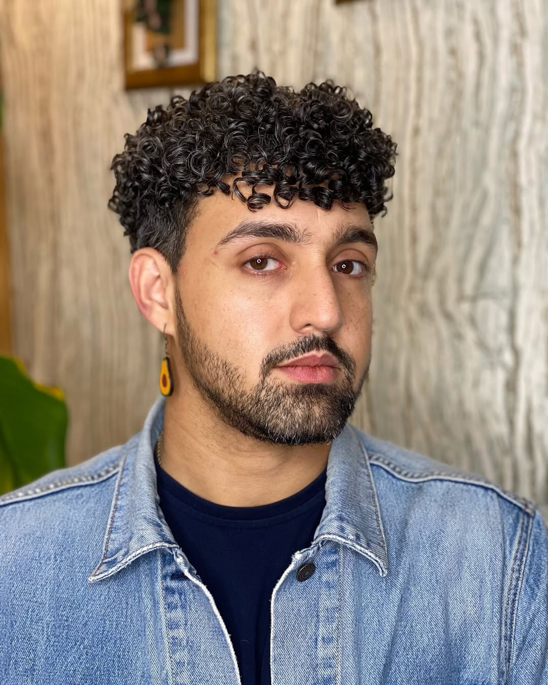 Vibrant Voluminous Curly Top with Natural Edges