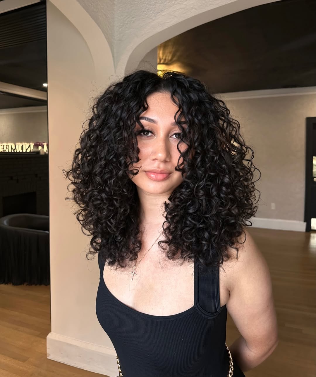 Deep Espresso Corkscrew Curls with Shoulder-Length Cut