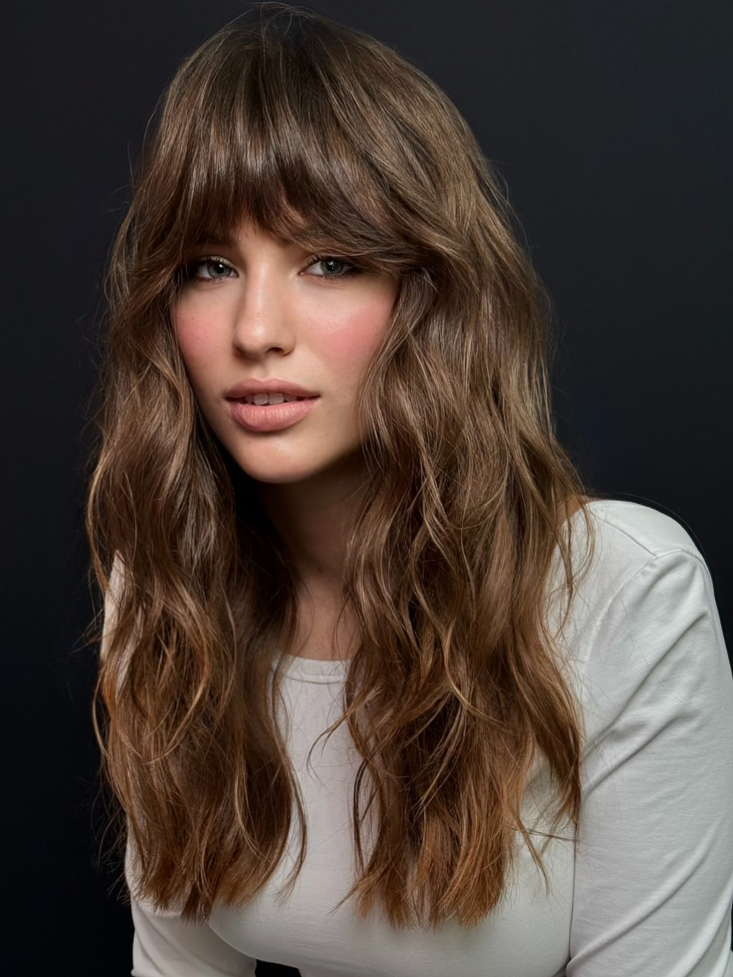 Sunkissed Brunette Tresses with Soft Bangs