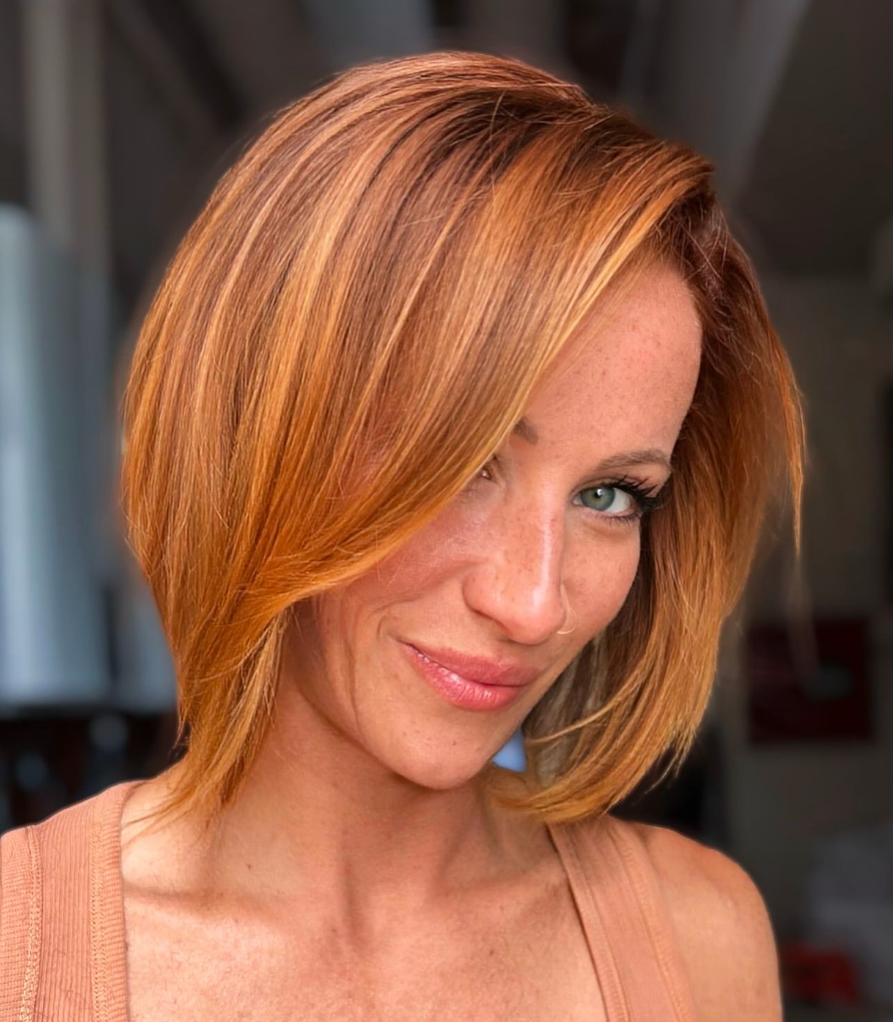 Short Chic Copper Bob with Blonde Highlights
