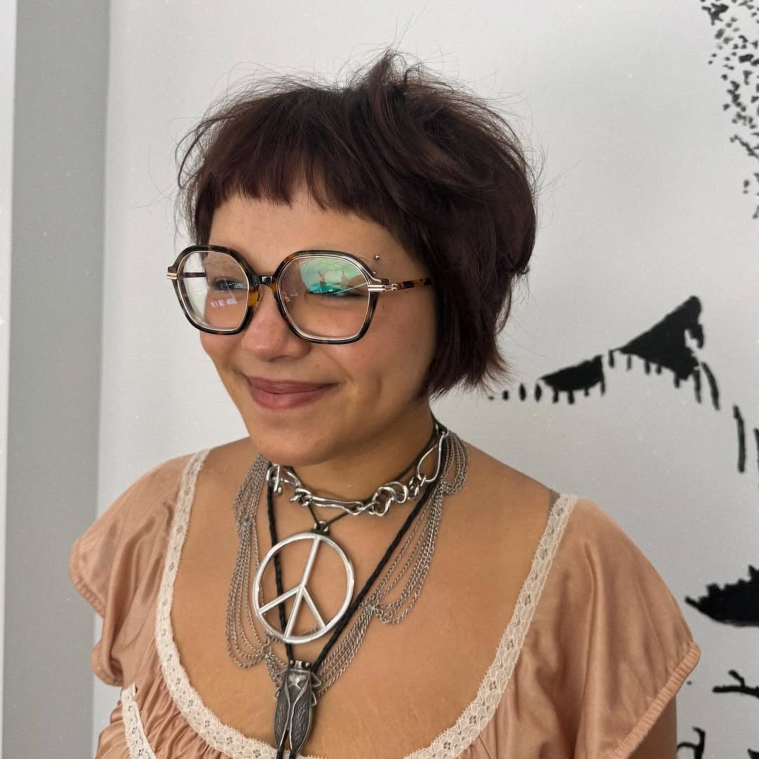 Chic Textured Bob with Short Layers and Wispy Bangs