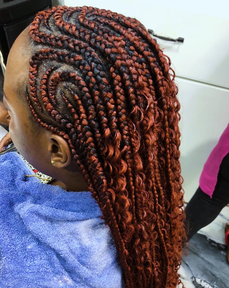 Bold Curly Braids with Fiery Highlights