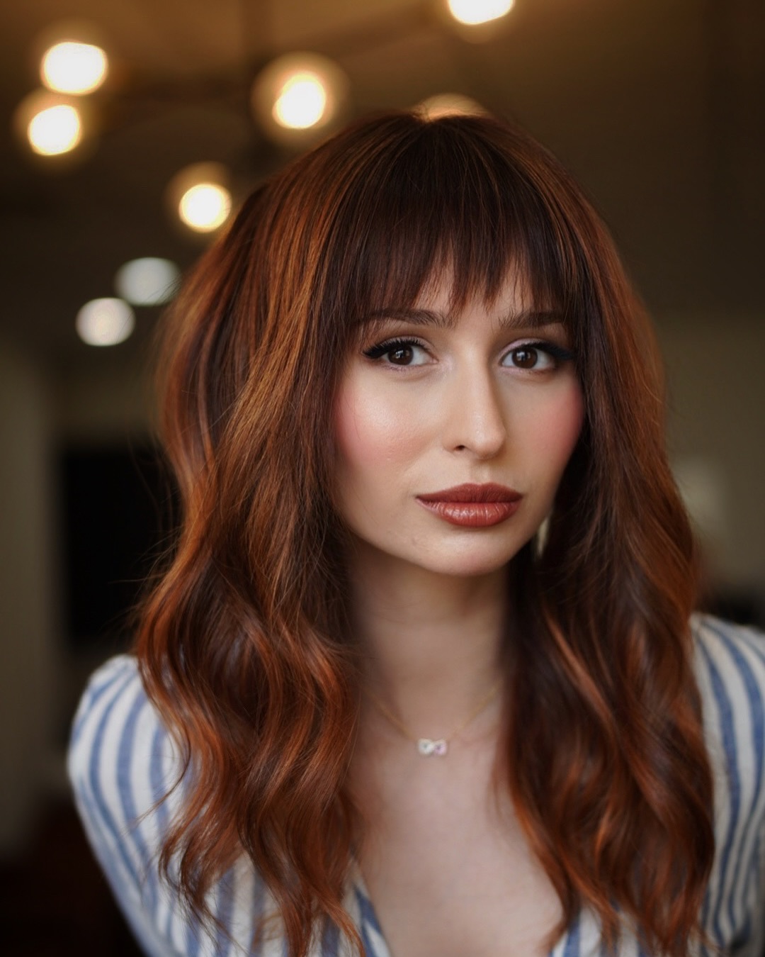 Copper-Tinted Smooth Waves with Sleek Fringe