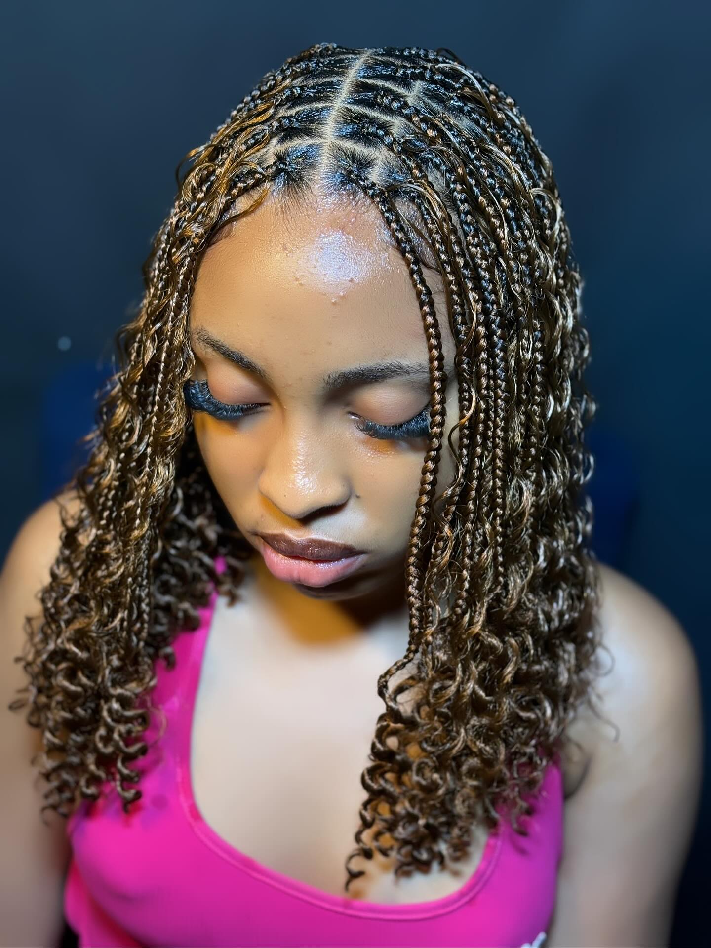 Glamorous Defined Twisted Curls with Subtle Highlights