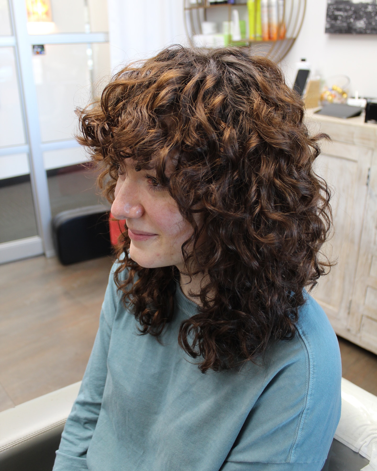 Playful Curly Wolf Cut with Lush Volume