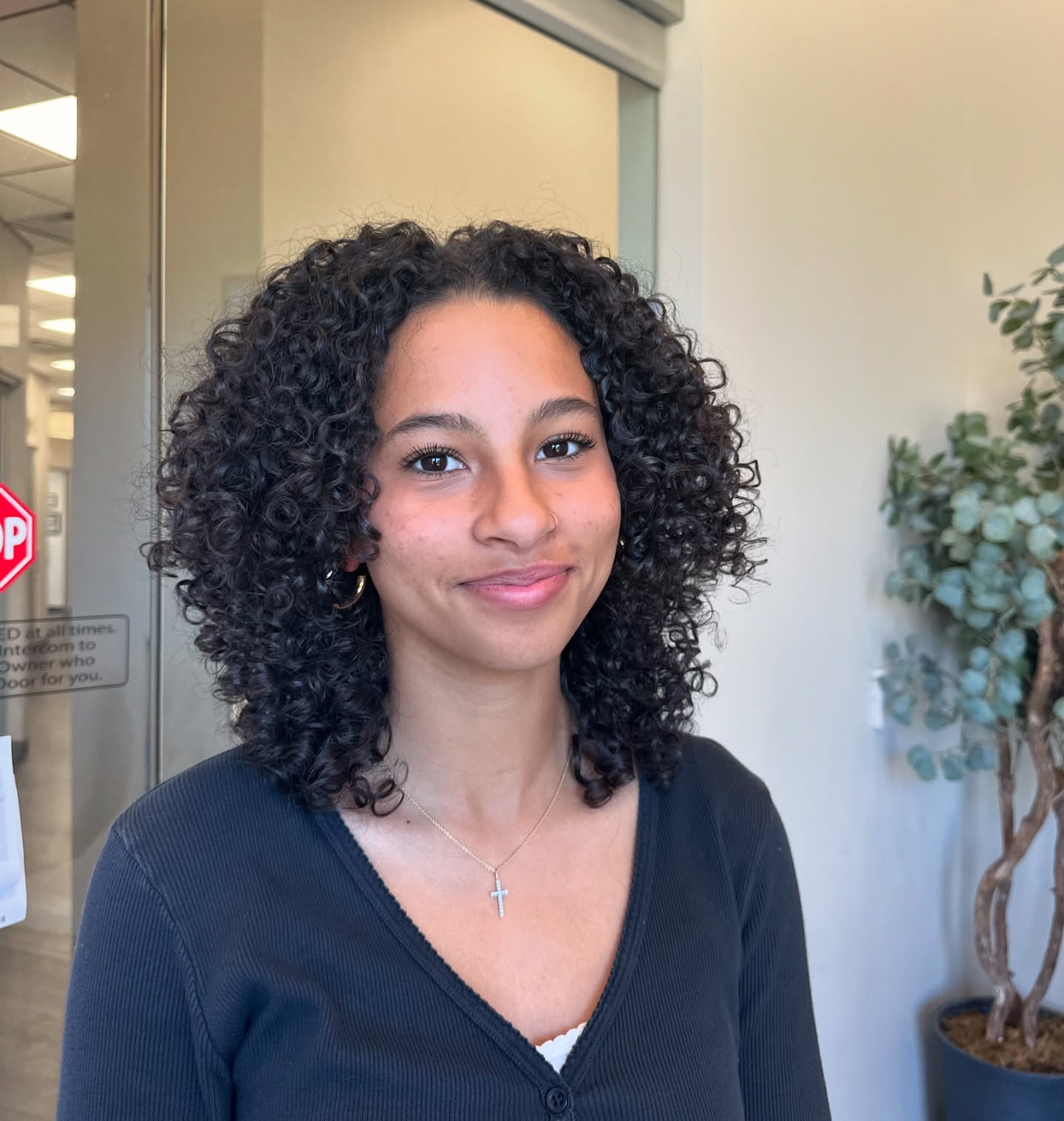 Voluminous Curly Bob with Defined Curls