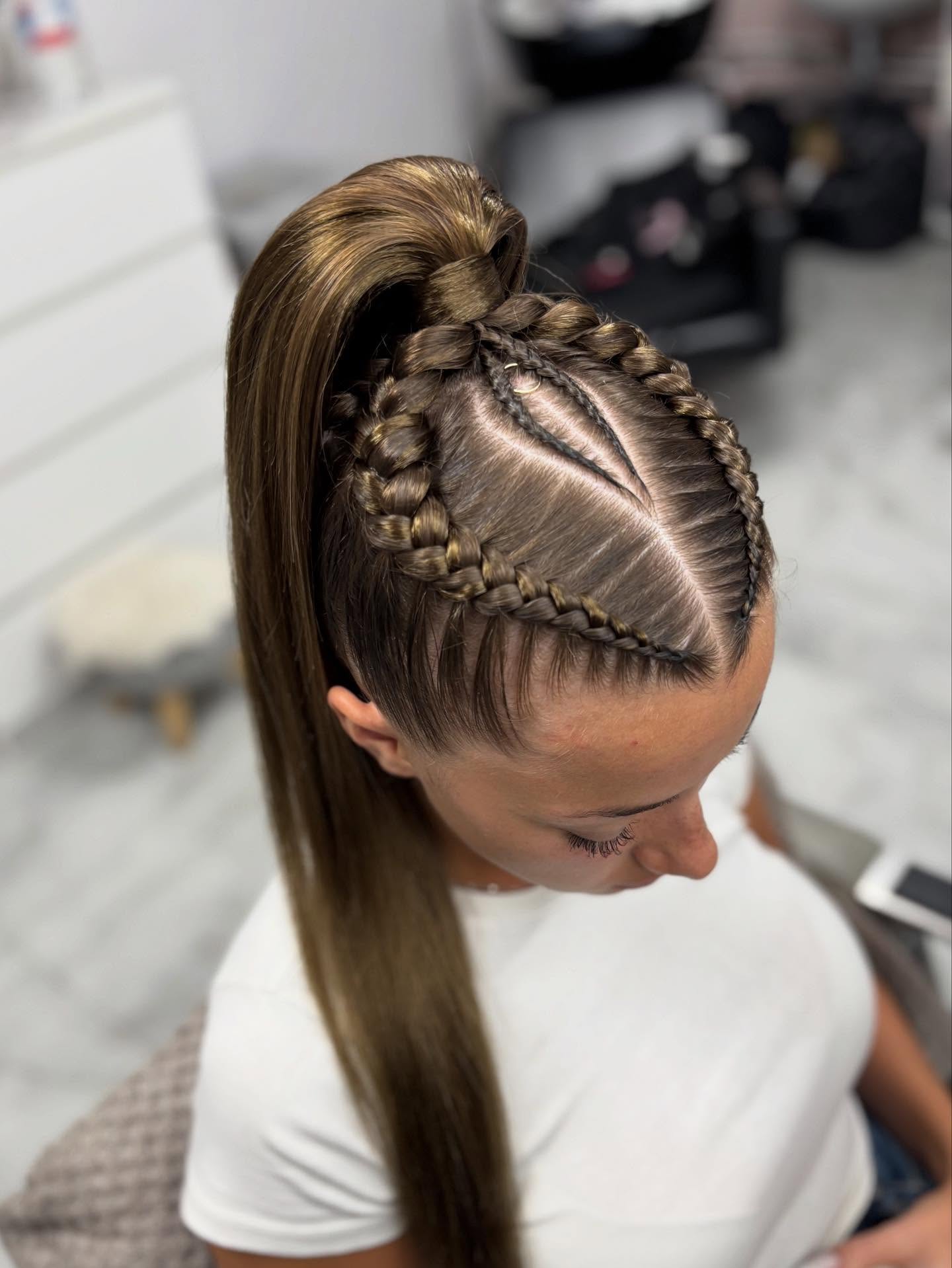 Chic High Ponytail with Intricate Cornrow Braids