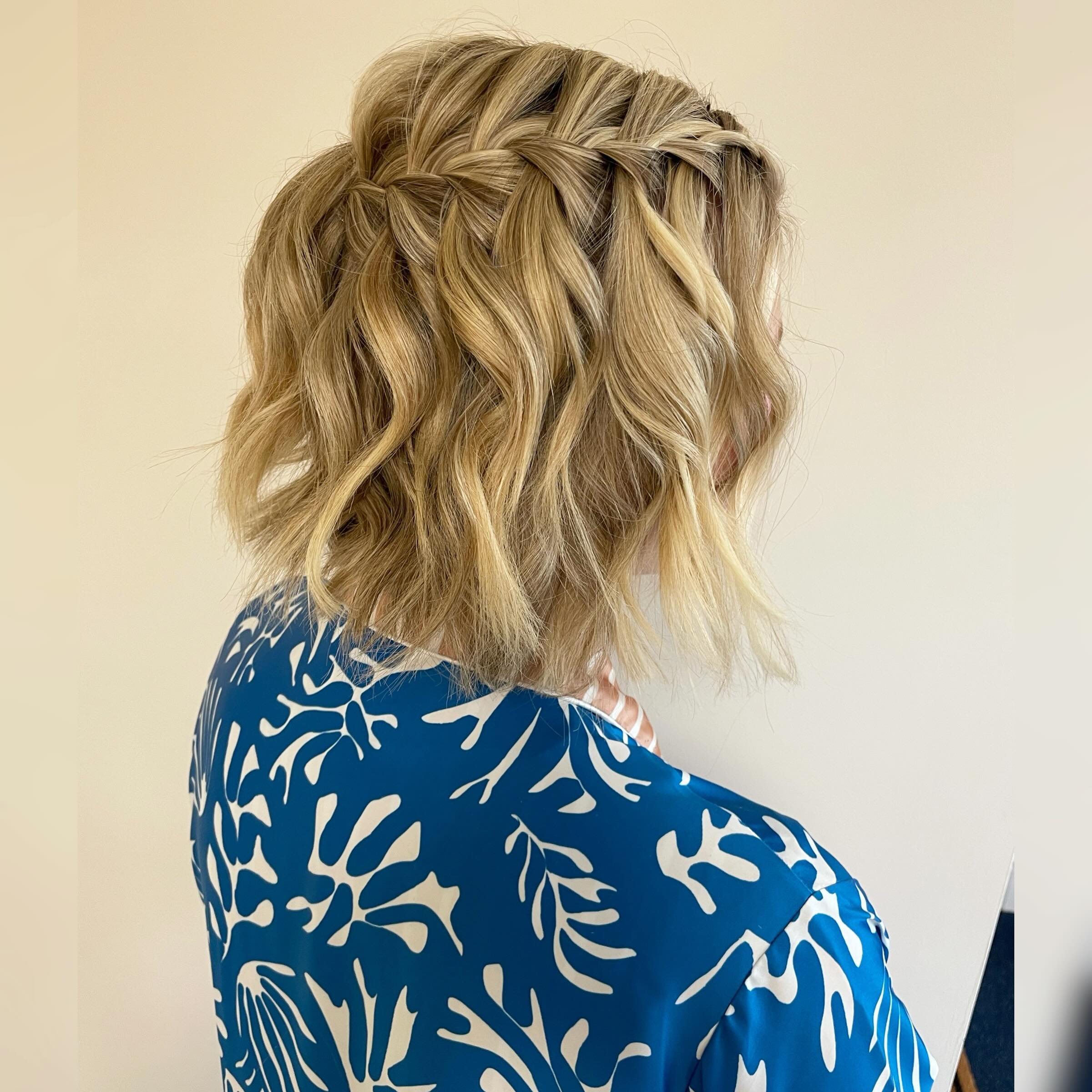 Textured Wavy Bob with Intricate Braiding