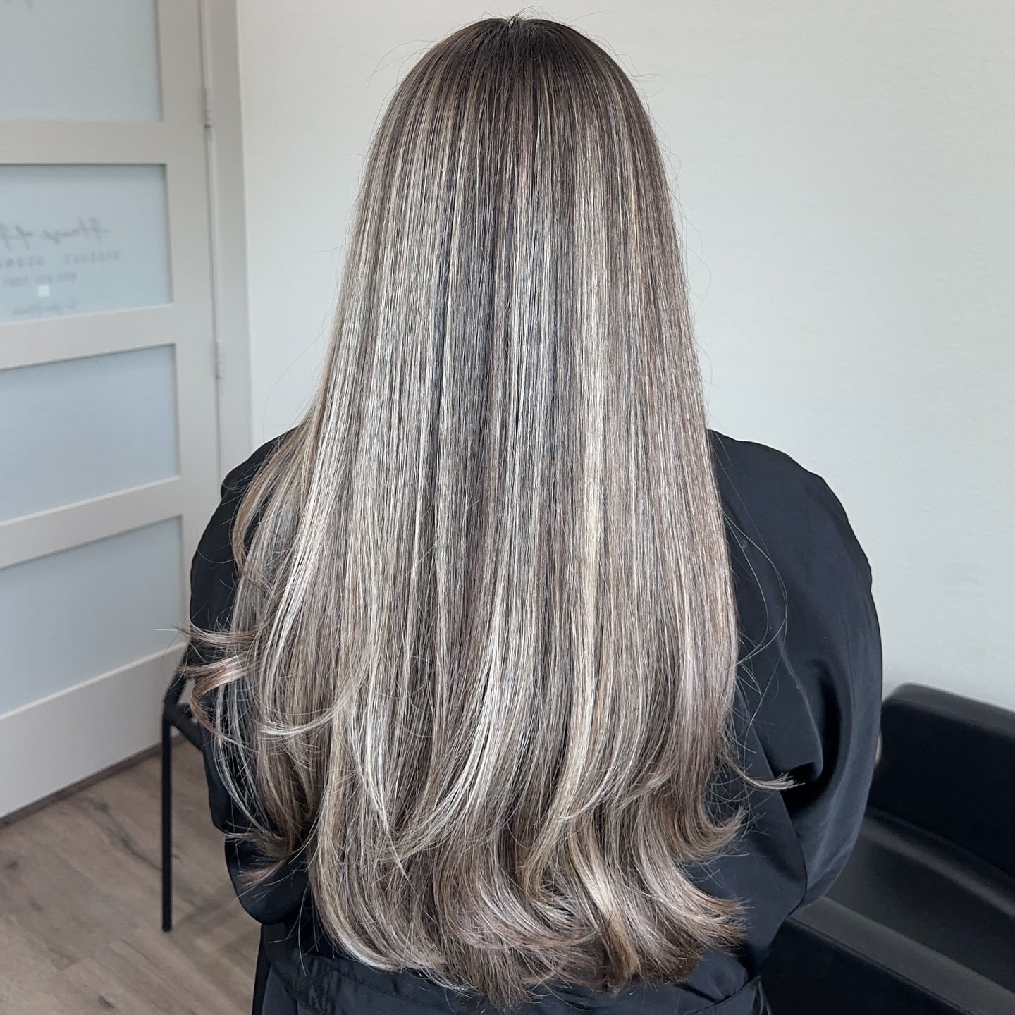 Elegant Long Silvery Blonde Layers with Subtle Highlights