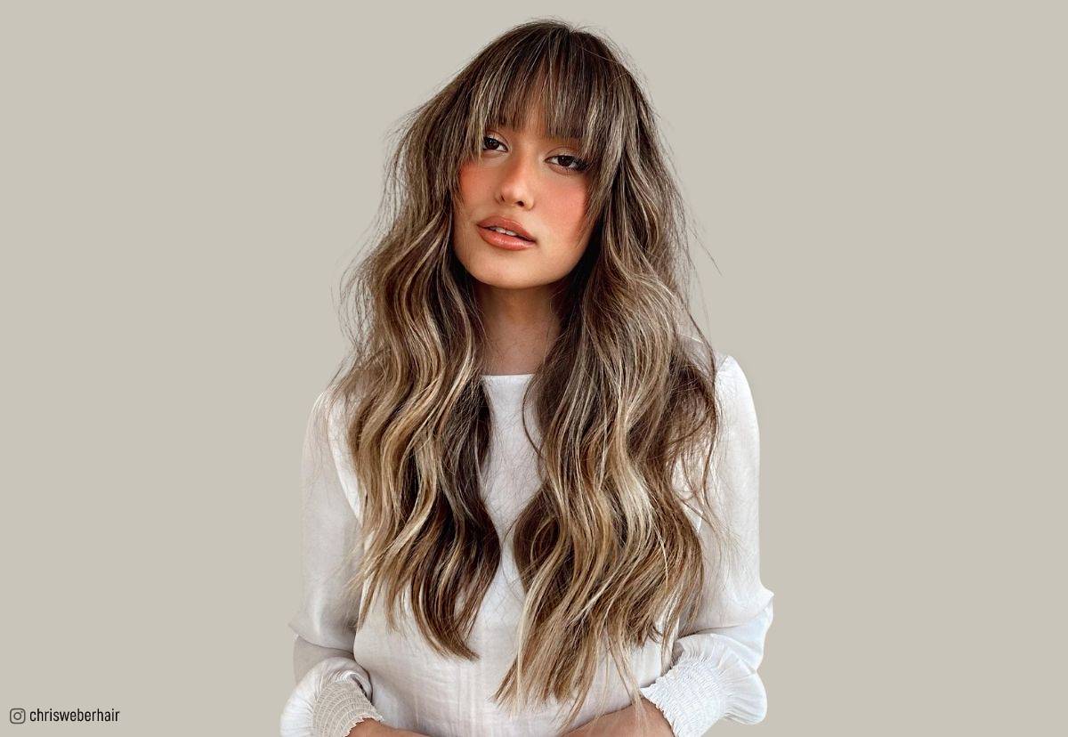 Image of Long layers with side bangs oblong face hairstyle female