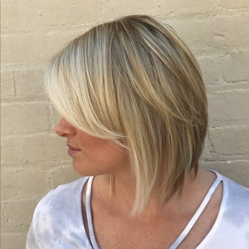 Adding bangs to a hairstyle is similar adding a cherry to the laissez passer on of an H2O ice cream sunday 53 Medium Hairstyles With Bangs: Our Latest Faves!