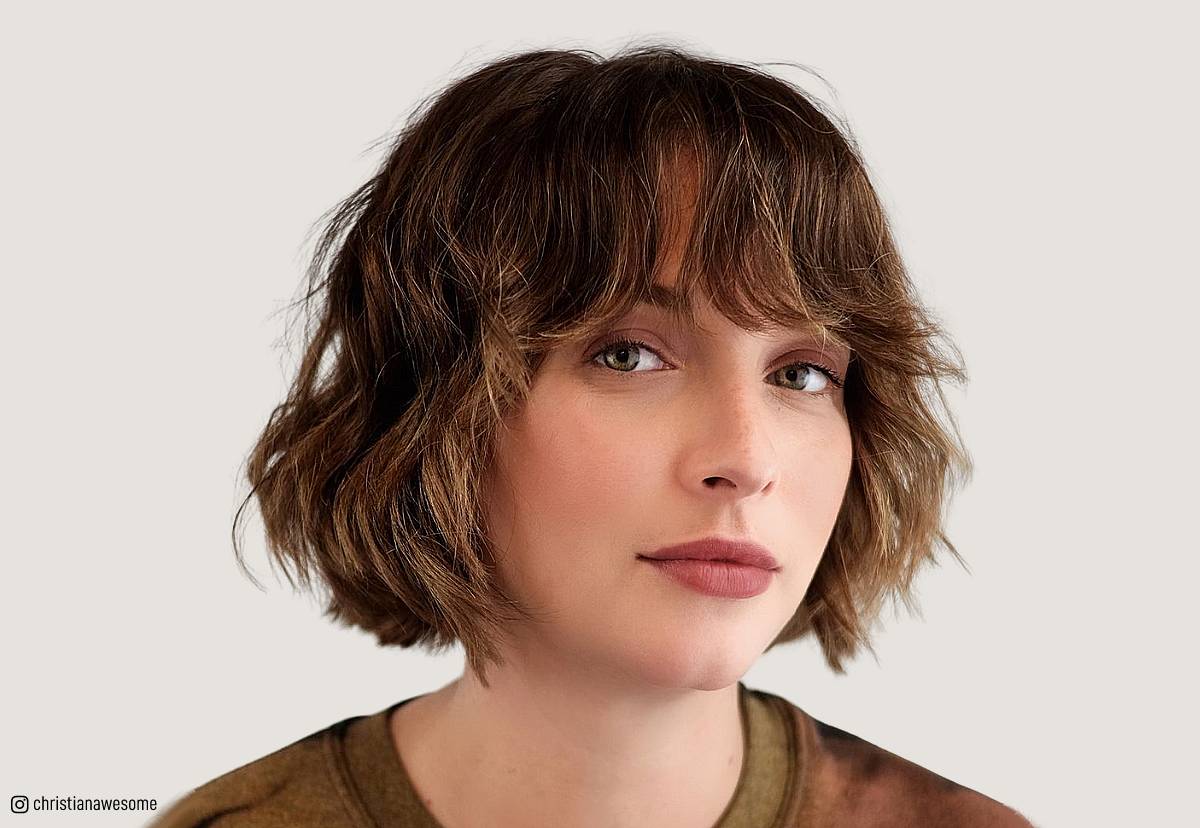 Image of Curly jaw length shag with layers