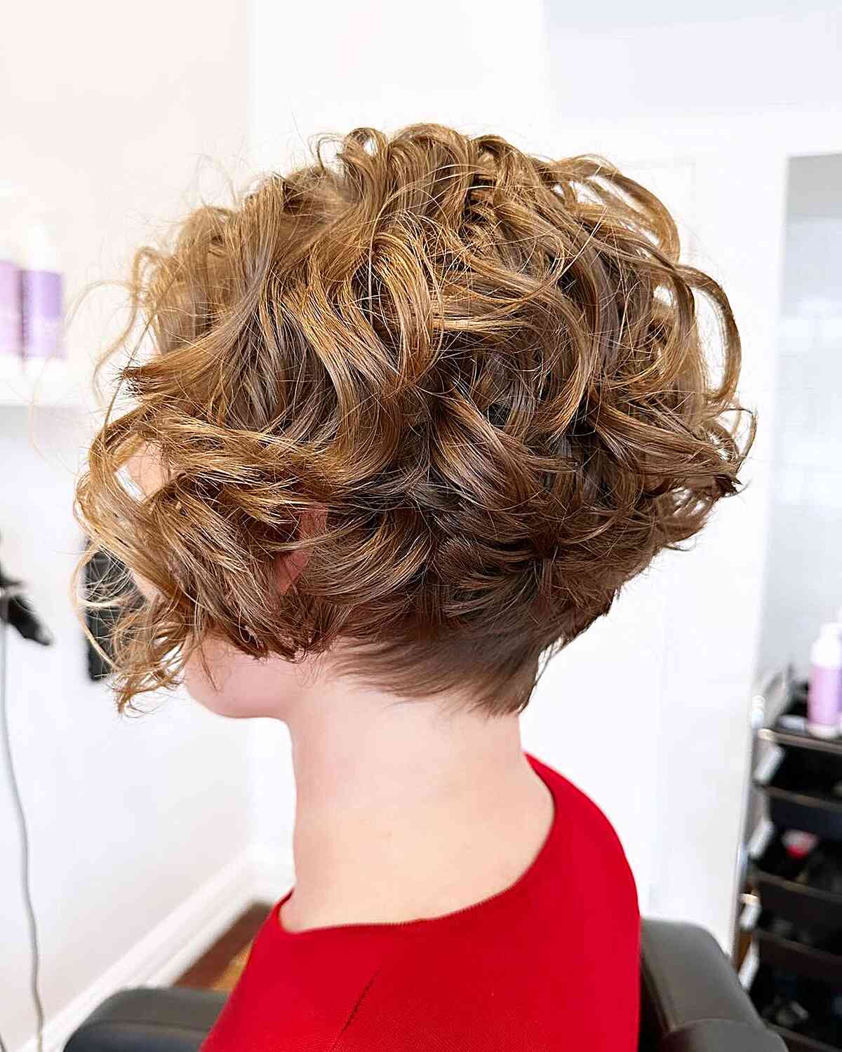 Jaw-Length Tapered Pixie Bob with Defined Curls