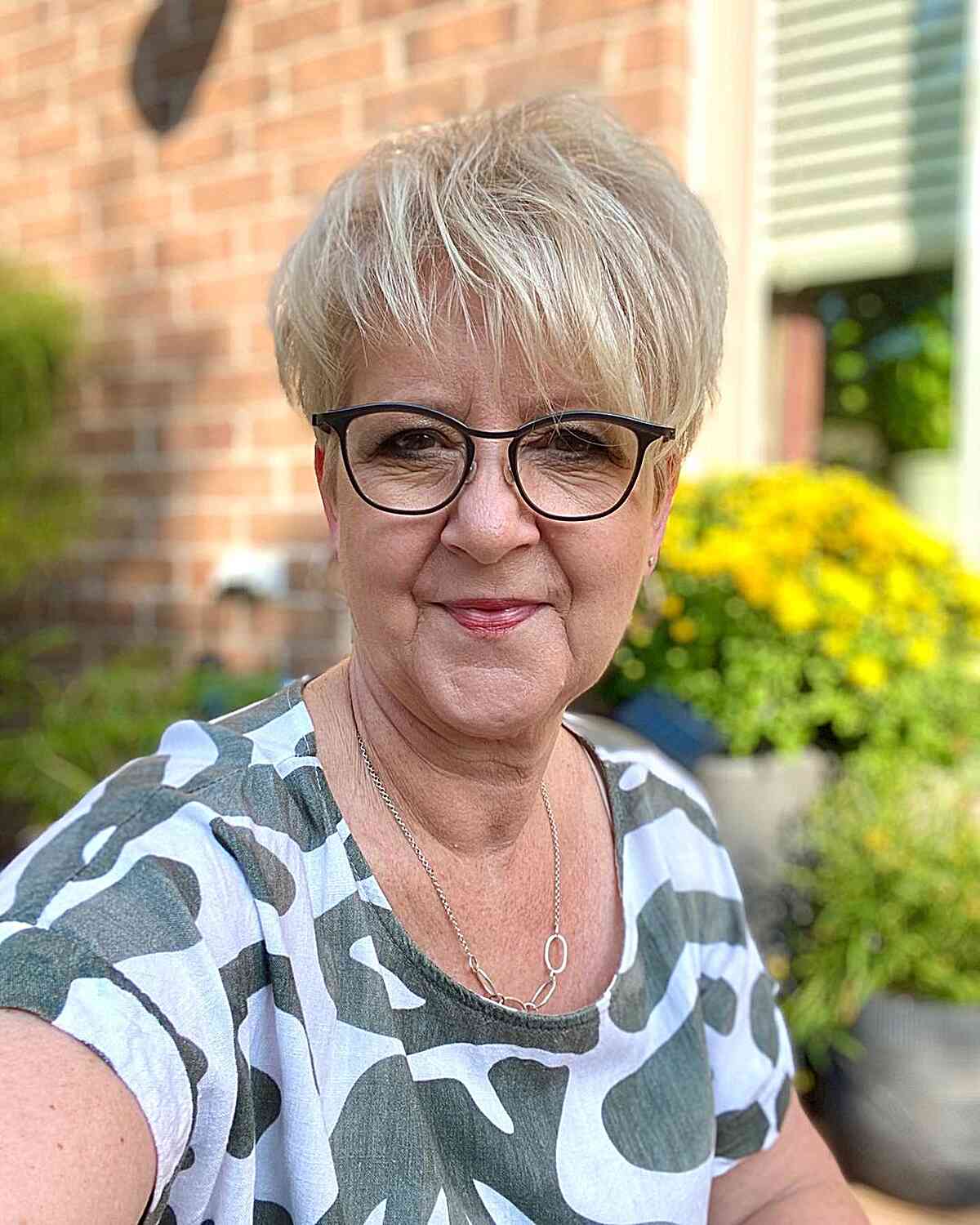 Layered Blonde Pixie on Women Over 50 with Fine Hair and Glasses