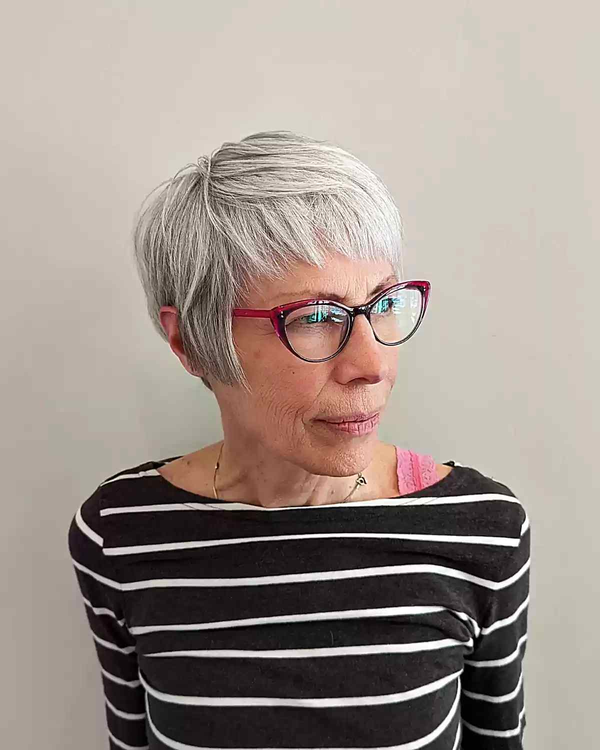 Layered Pixie Hair with Short Bangs on Women Over 60