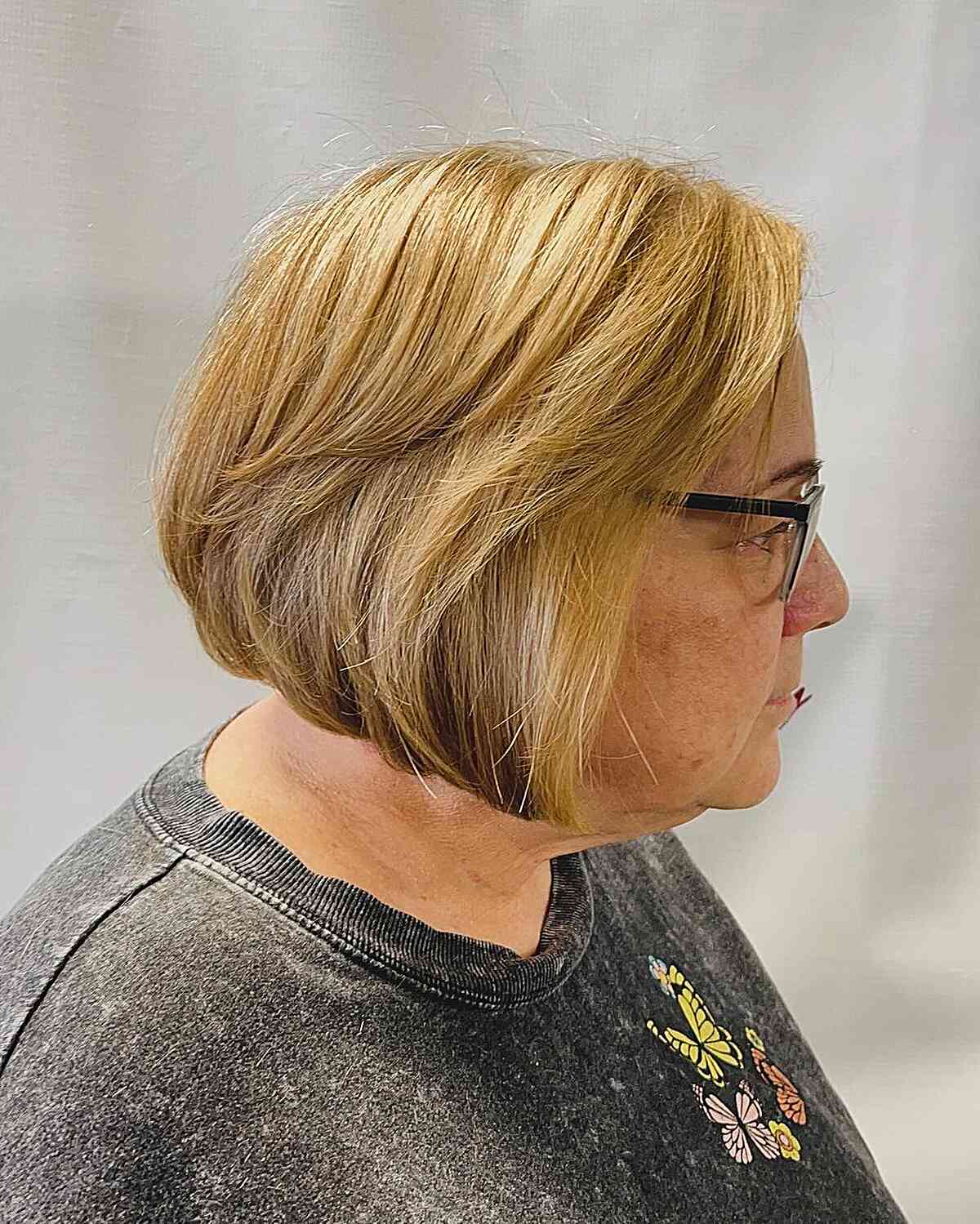 Light Blonde on Graduated Chin-Length Bob for 60-year-olds with Thick Hair