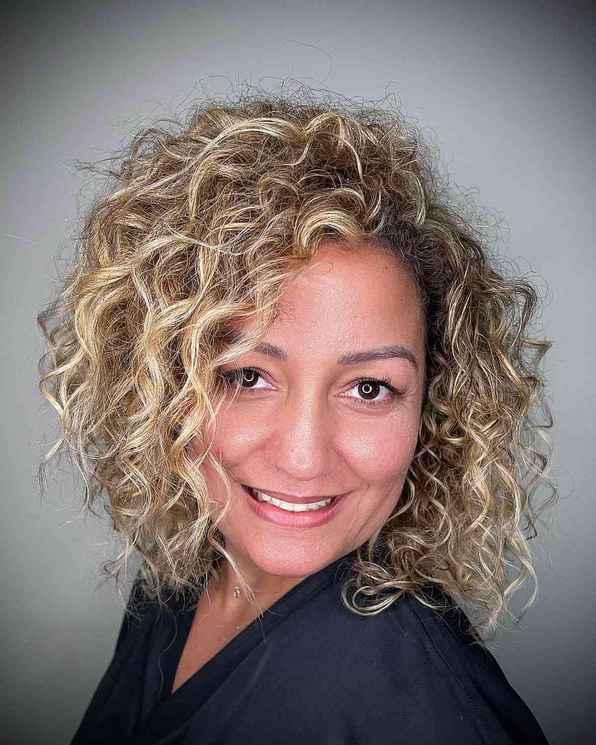 Light Blonde Very Curly Medium-Length Hair