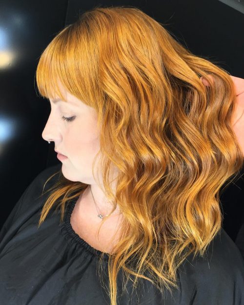 A long bob amongst bangs is a haircut that ends anywhere betwixt the shoulder together with collarbone  22 Chic Long Bob amongst Bangs