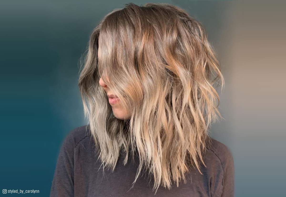 Image of Long choppy shag haircut with blunt ends