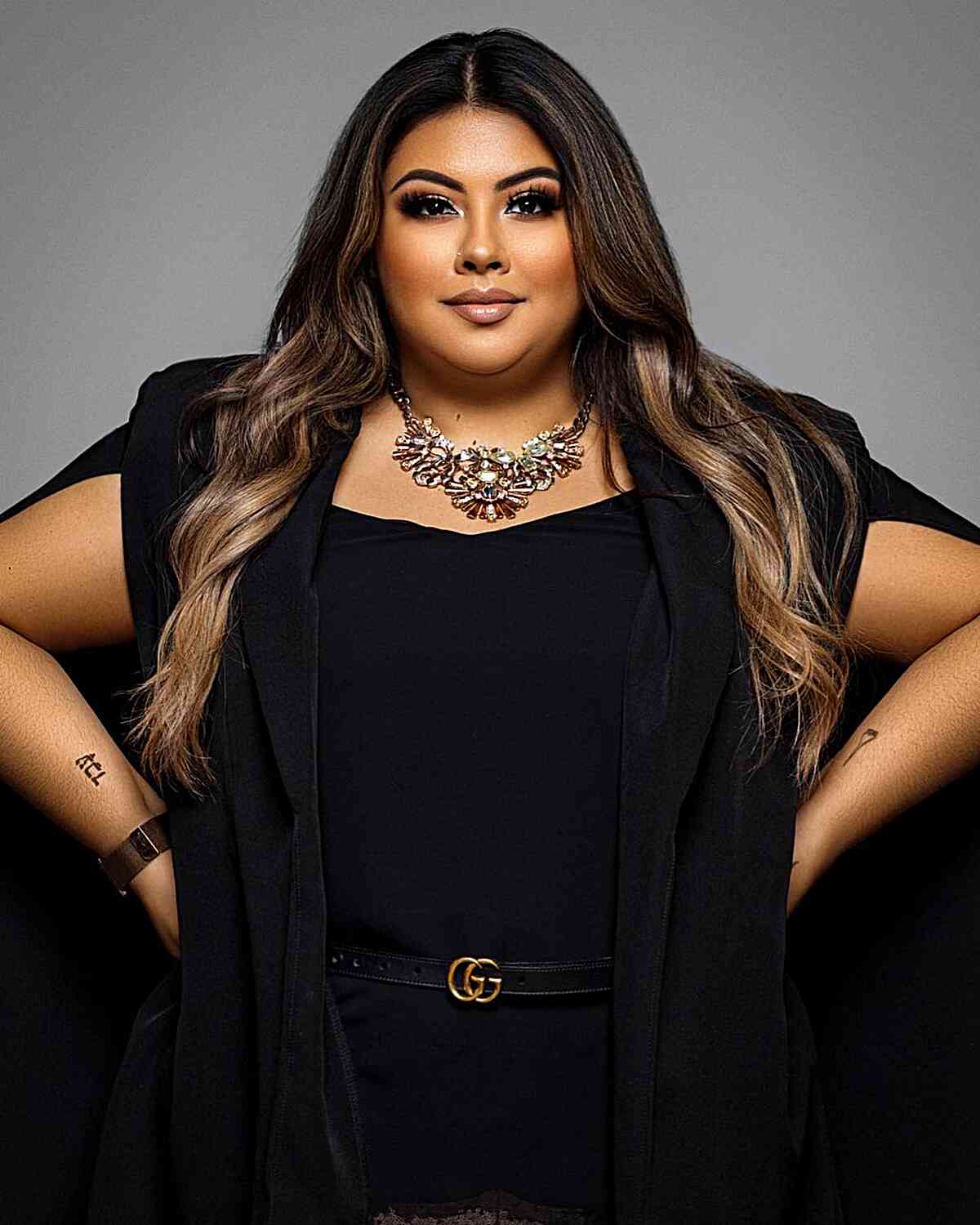 Long Dark Straight Hair with a Middle Part for Round Faces