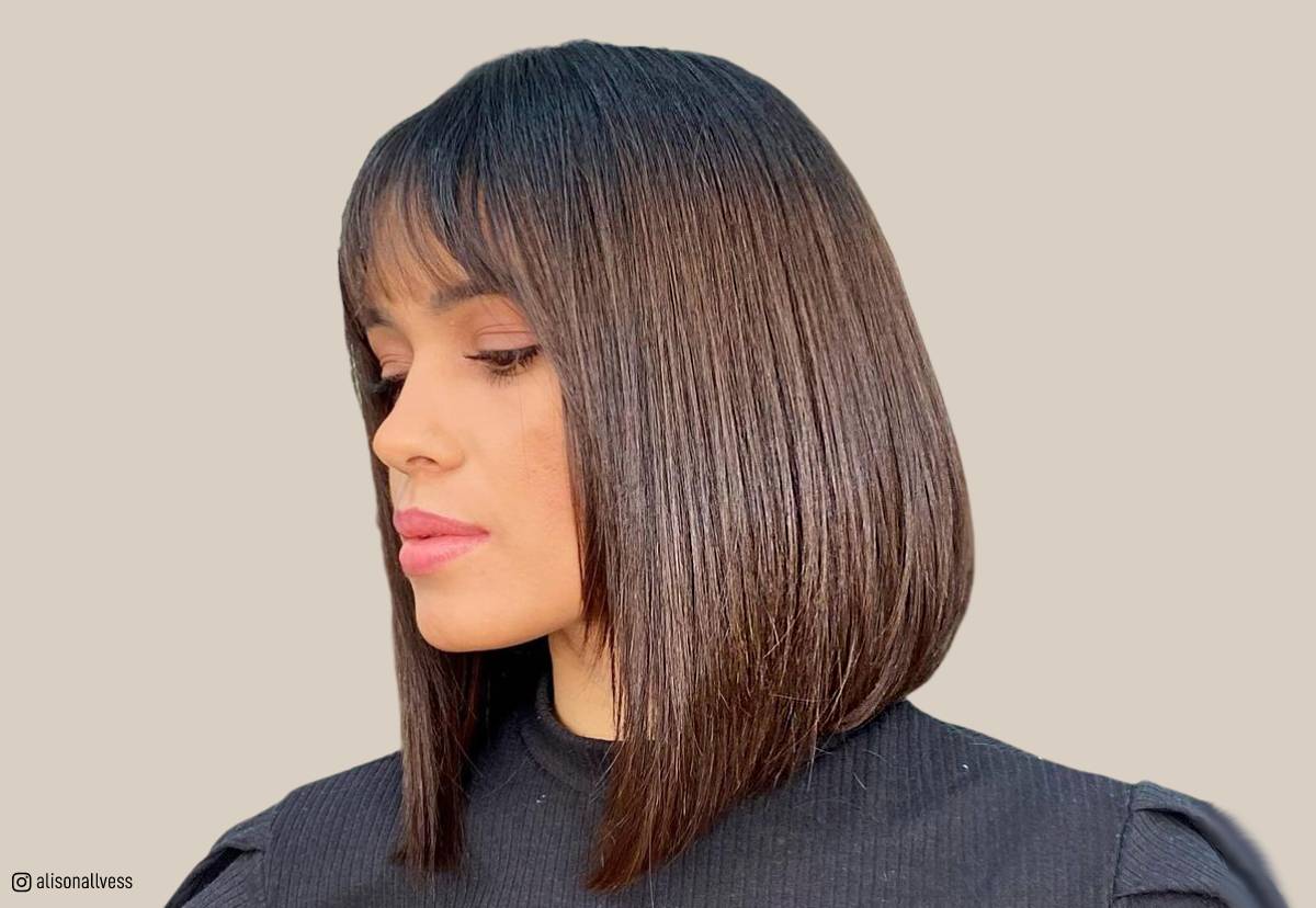 Image of Graduated blunt cut long hair with bangs