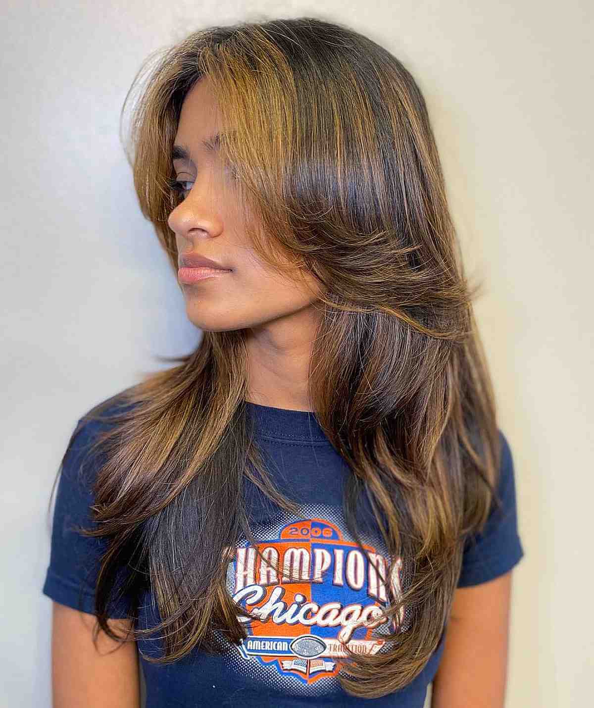 Popular Long Hair with Long Face-Framing Bangs and Layers