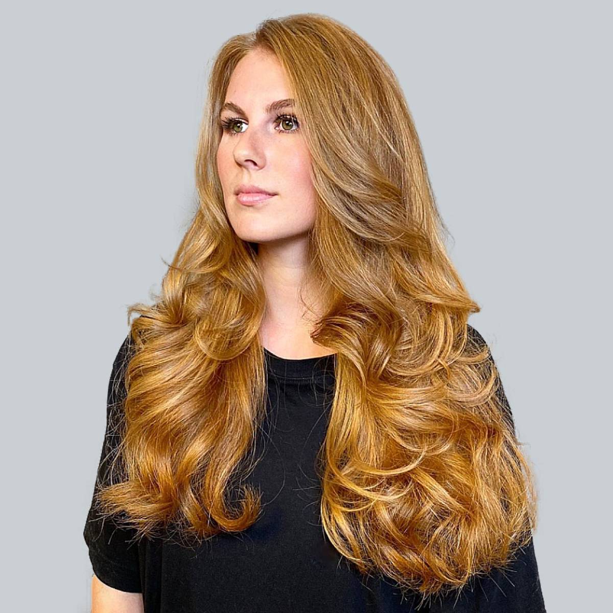 Image of Long layered waves hairstyle for oval face female wavy hair