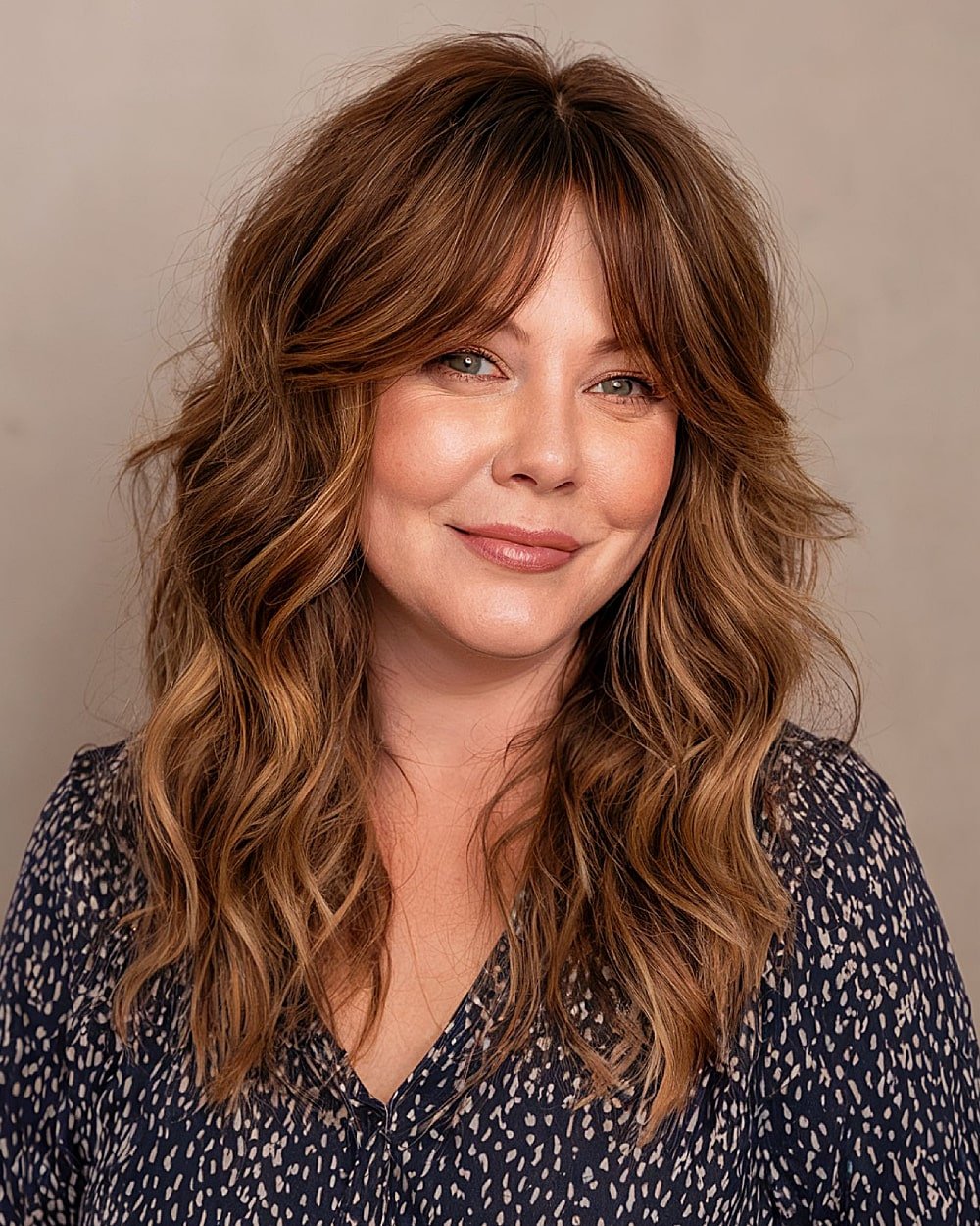 Long shag haircut with tousled layers and curtain fringe for an alt-style textured look