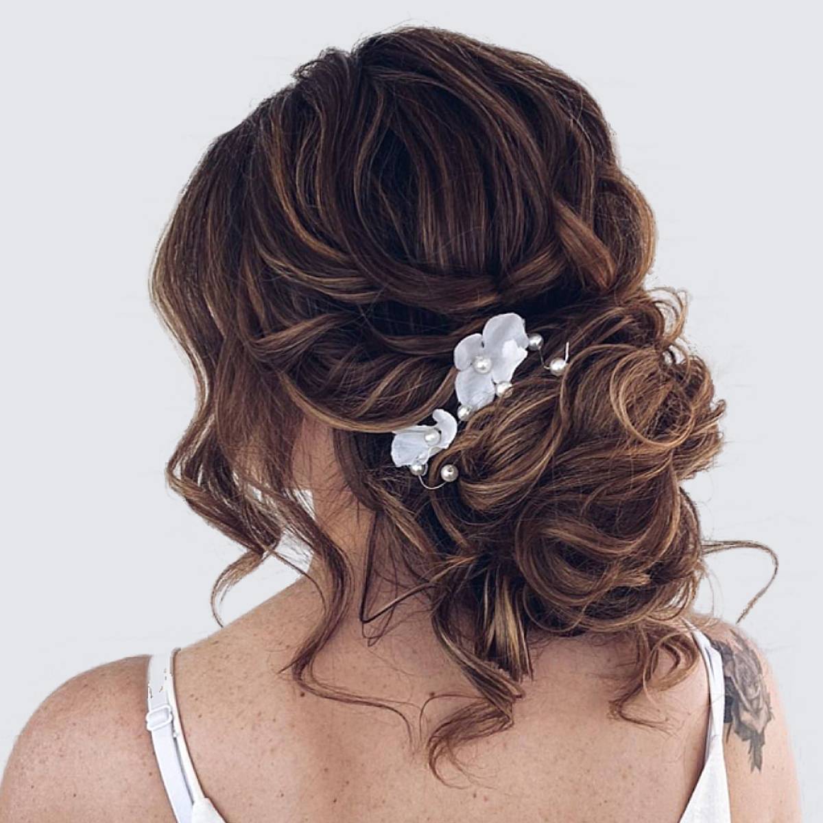 Image of Loose updo bridal hair for oval face