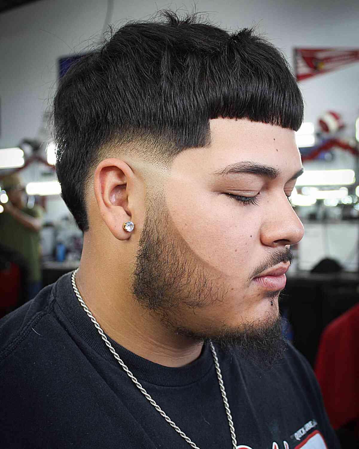 Low Burst Fade with Cropped Bangs for Men