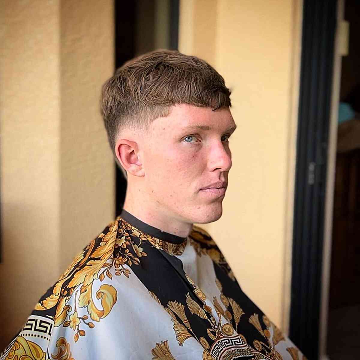 Low Buzz Burst Fade and Short Bangs for Young Guys