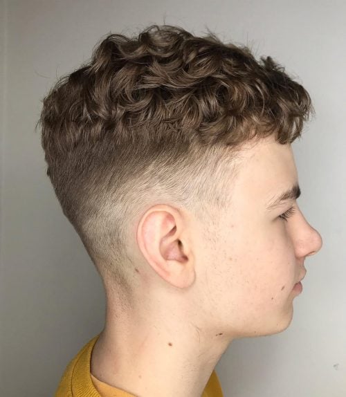 16 Best Curly Hair Fade Haircuts For Guys In 2020